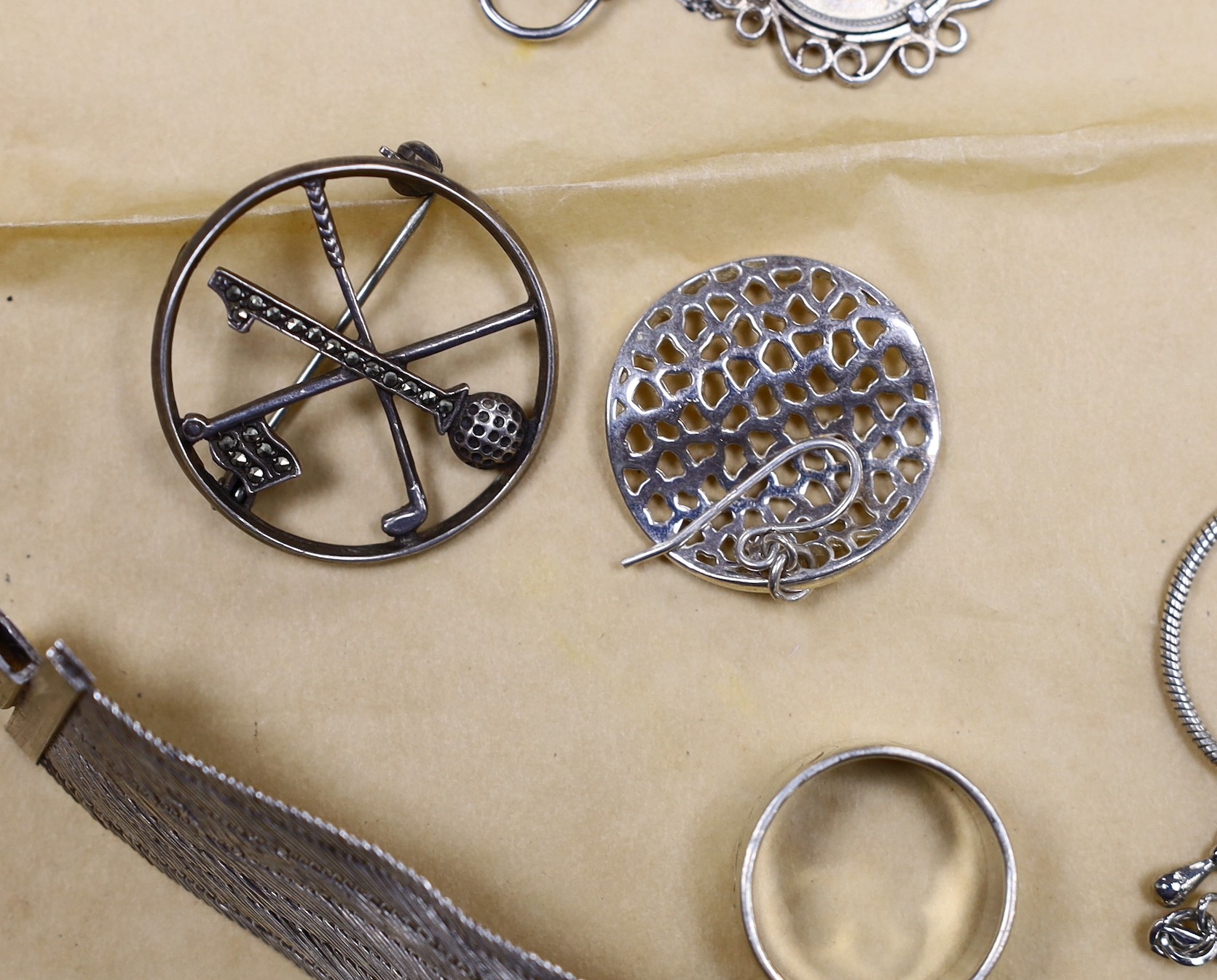 A collection of assorted silver and white metal jewellery, including marcasite